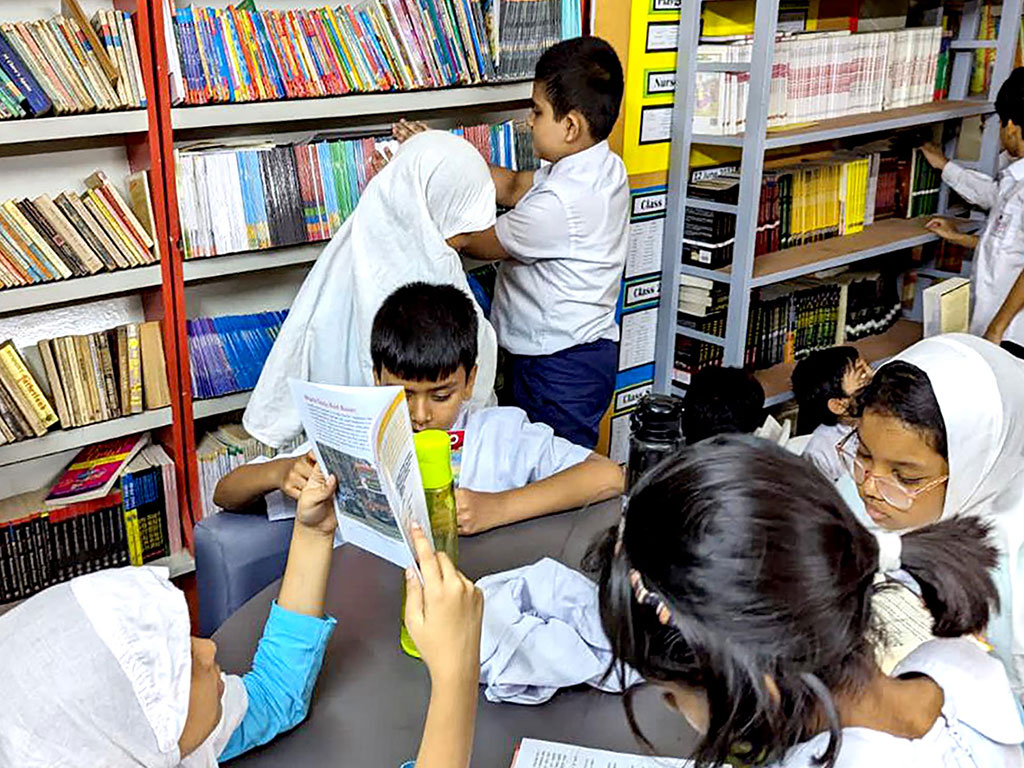 Students Reading Books in the Library PSD